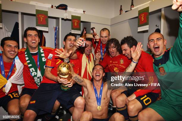 Spain celebrate in their dressing room after they won the 2010 FIFA World Cup at Soccer City Stadium on July 11, 2010 in Johannesburg, South Africa.