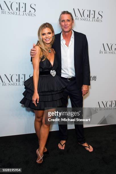 Elizabeth Sulcer and Russell James attend the Russell James 'Angels' book launch & exhibit at Stephan Weiss Studio on September 6, 2018 in New York...