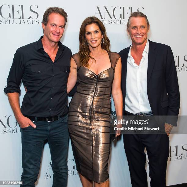 Rande Gerber, Cindy Crawford and Russell James attend the Russell James 'Angels' book launch & exhibit at Stephan Weiss Studio on September 6, 2018...