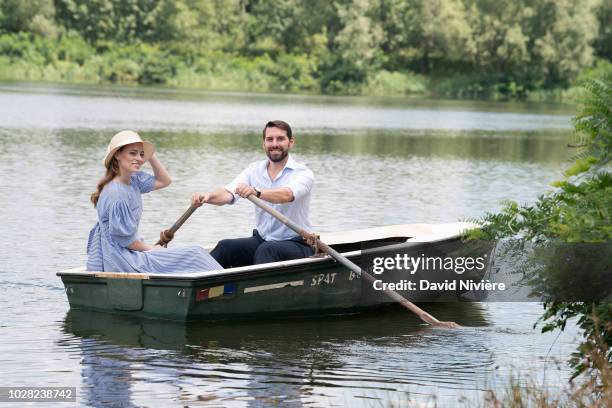 Prince Nicholas Of Romania and Princess Alina Of Romania pose during a summer photo session in a public park on August 04, 2018 in Bucharest, Romania.