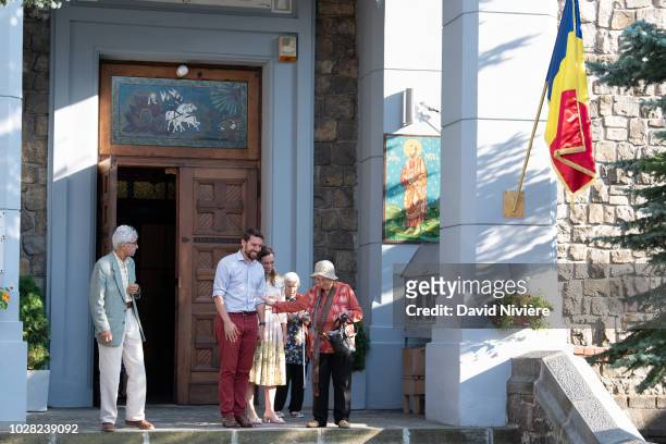 Prince Nicholas Of Romania and Princess Alina Of Romania leave the Stabtul Illie Church on August 05, 2018 in Sinaia, Romania.