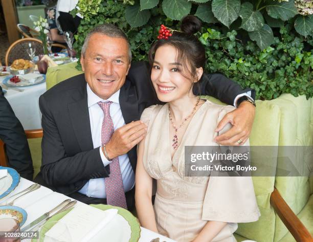 Jean-Christophe Babin and Shu Qi pose at the Bulgari exhibition in GUM as part of the Bulgari exhibition at Kremlin Museum on September 6, 2018 in...