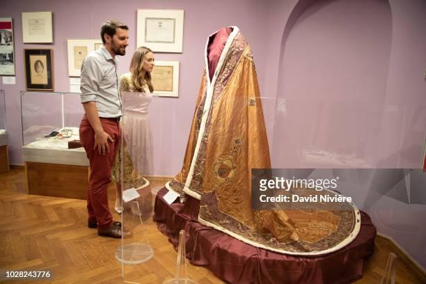Prince Nicholas Of Romania and Princess Alina Of Romania visit the exhibition of Queen Marie of Romania on August 05, 2018 in Sinaia, Romania.