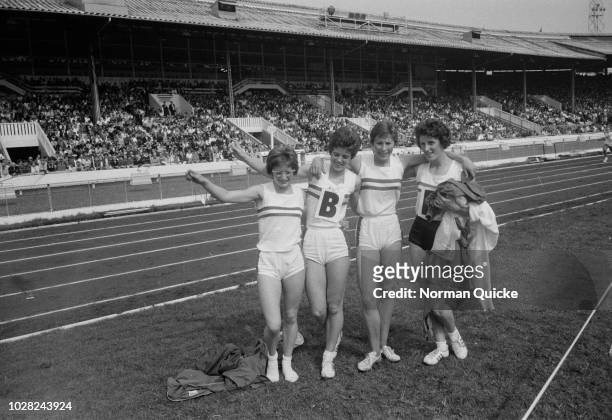 British athletes, from left, Madeleine Cobb, Daphne Arden, Mary Rand and Dorothy Hyman pictured together after setting a new world record time in the...