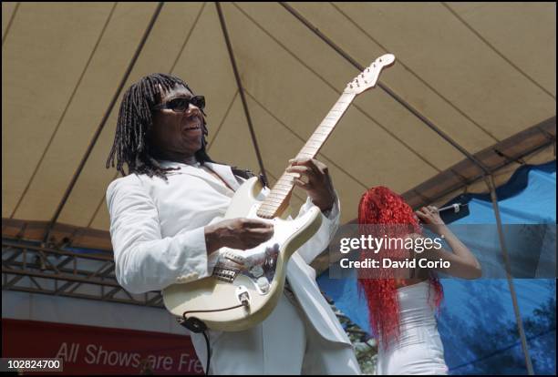 Nile Rodgers of Chic performs on stage at the Metrotech Centre on 1 July 2004 in Brooklyn, New York.