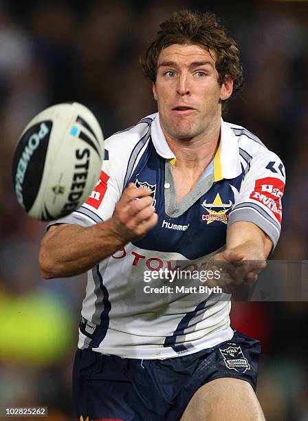 Ashley Graham of the Cowboys offloads the ball during the round 18 NRL match between the Parramatta Eels and the North Queensland Cowboys at...