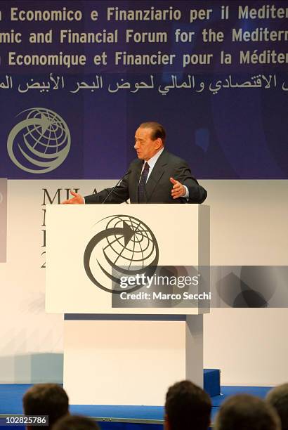 Italian Prime Minister Silvio Berlusconi gives the final speech at the opening session of the Med Forum 2010 on July 12, 2010 in Milan, Italy. The...