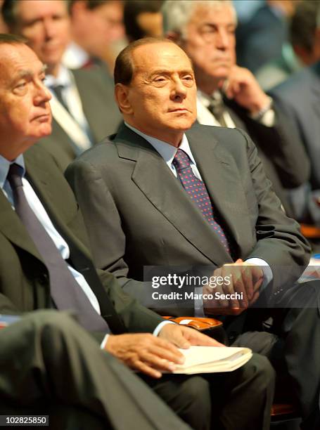 Italian Prime Minister Silvio Berlusconi attends the opening session of the Med Forum 2010 on July 12, 2010 in Milan, Italy. The Milano Med Forum is...