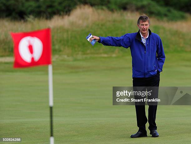 Ken Brown of England the BBC Television commentator out on the links during practice for the 139th Open Championship on the Old Course, St Andrews on...