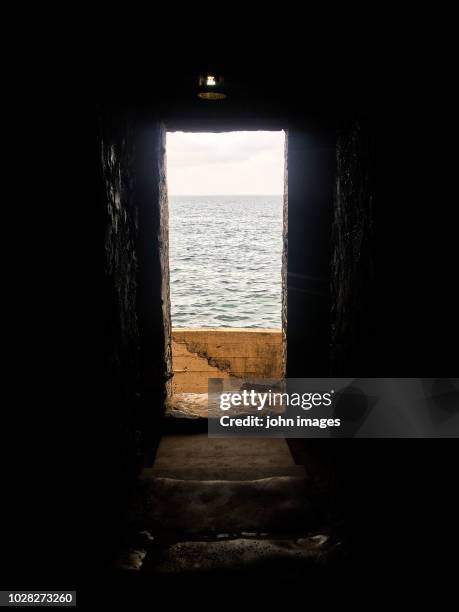 the door of no return - human trafficking stock pictures, royalty-free photos & images