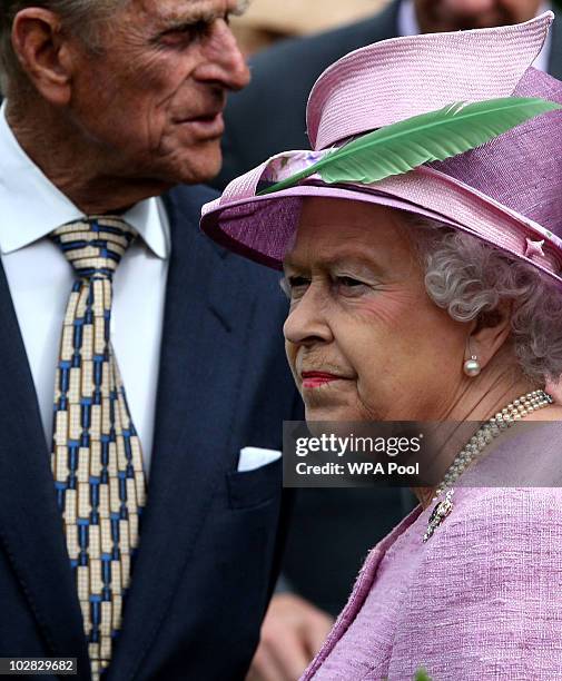 Queen Elizabeth II and Prince Philip, Duke of Edinburgh visit the Queen Mother Memorial Garden during a visit to officially open a Visitor Centre at...