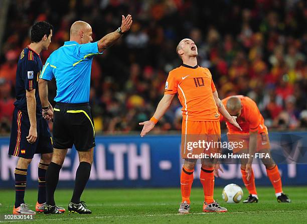 Wesley Sneijder of Netherlands reacts to a decision by referee Howard Webb of Englandduring the 2010 FIFA World Cup South Africa Final match between...