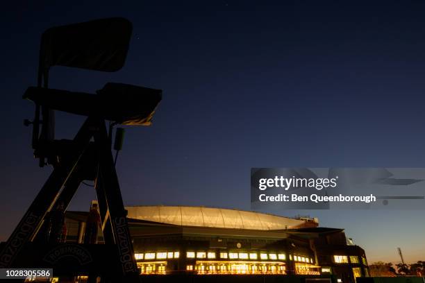 general views of centre court at night on grounds of the all england lawn tennis club, home to wimbledon championships - wimbledon centre court stock pictures, royalty-free photos & images