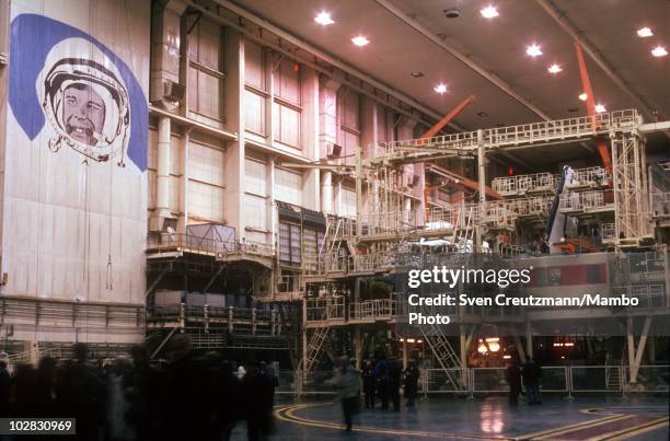 The image of Russian cosmonaut Yuri Gagarin overlooks the construction site of a Buran spacecraft in a hangar, on March 19 in Moscow, Russia. The...