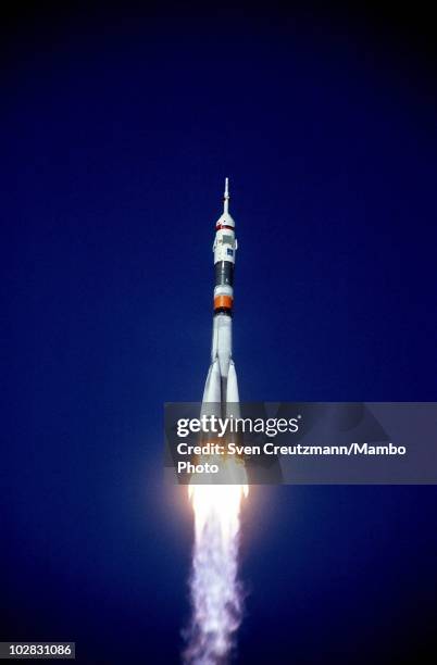 Soyuz TM-14 takes off at the Baikonur Cosmodrome rocket launch ramp, on March 17 in Baikonur, Kazakhstan. The Soyuz TM-14 spacecraft left the...