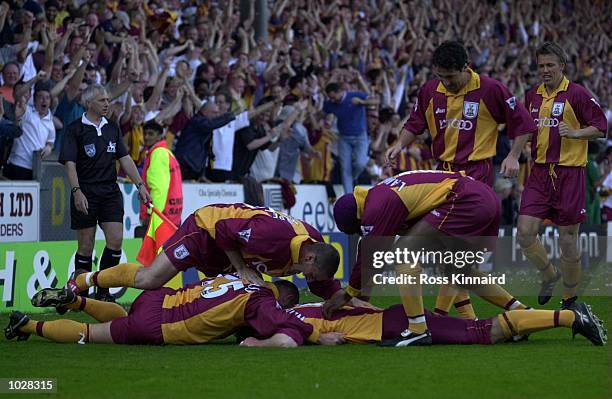 David Weatherall of Bradford celebrates with teammates after scoring the opening goal during the Bradford City v Liverpool FA Carling Premiership...