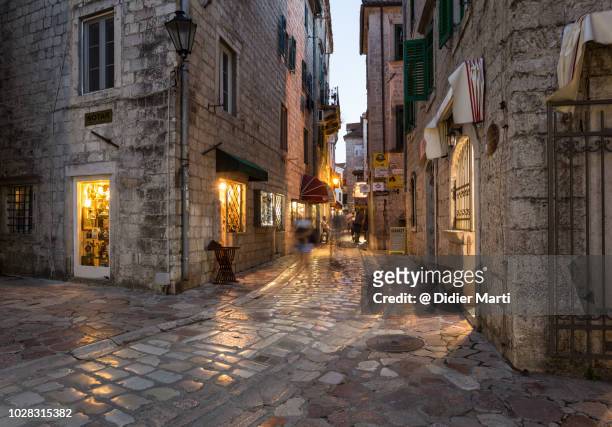 the streets of kotor old town in montenegro - 狭い ストックフォトと画像
