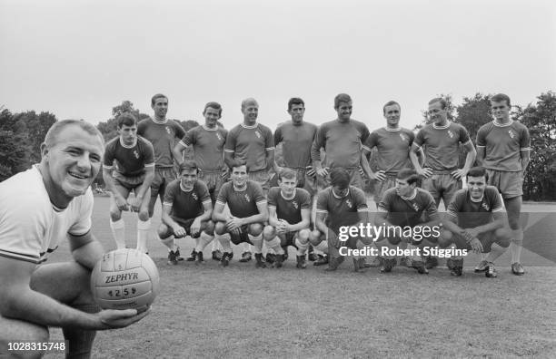 Scottish manager Tommy Docherty with Chelsea FC soccer players, UK, 24th July 1964.