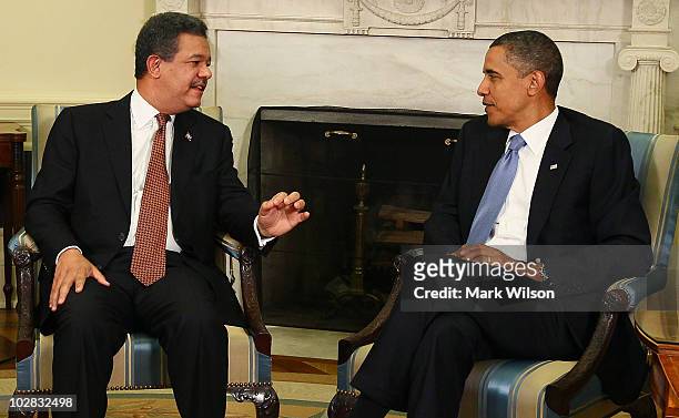 President Barack Obama meets with Dominican Republic President Leonel Fernandez in the Oval Office of the White House on July 12, 2010 in Washington,...