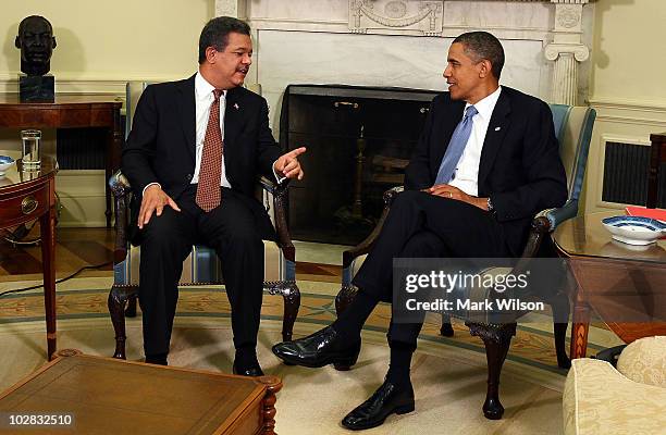 President Barack Obama meets with Dominican Republic President Leonel Fernandez in the Oval Office of the White House on July 12, 2010 in Washington,...