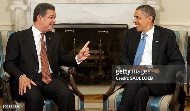 President Barack Obama meets with President Leonel Fernandez of the Dominican Republic in the Oval Office of the White House in Washington on July...