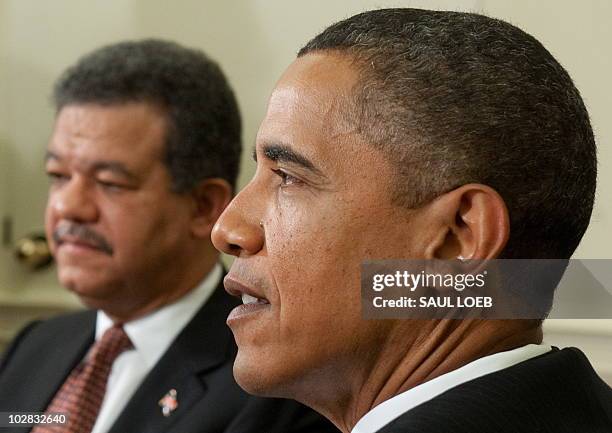 President Barack Obama meets with President Leonel Fernandez of the Dominican Republic in the Oval Office of the White House in Washington on July...