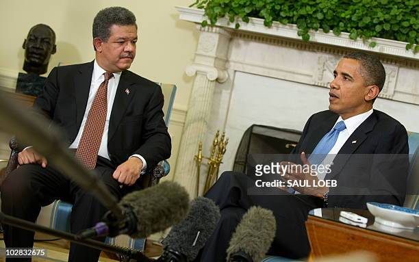President Barack Obama meets with President Leonel Fernandez of the Dominican Republic in the Oval Office of the White House in Washington on July...