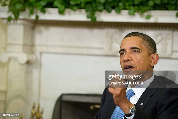 President Barack Obama speaks during a meeting with President Leonel Fernandez of the Dominican Republic in the Oval Office of the White House in...