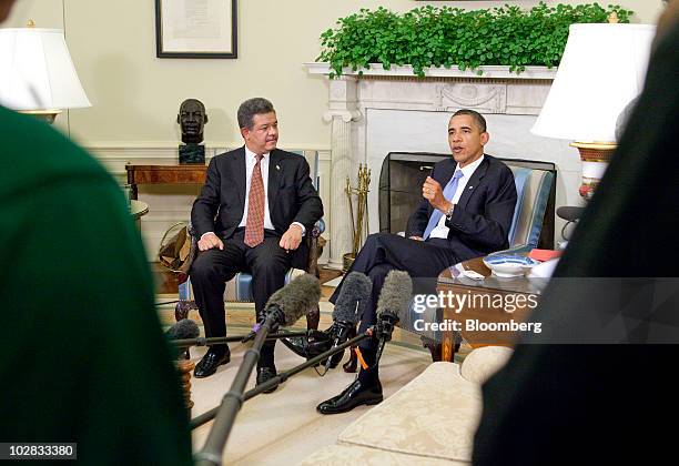 President Barack Obama and Leonel Fernandez, president of the Dominican Republic, speak after a bilateral meeting in the Oval Office of the White...