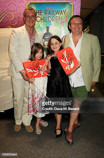 Stephen Tompkinson, Daisy Tompkinson, Molly Prendergast and Shaun Prendergast attend the press night for The Railway Children at The Waterloo Station...