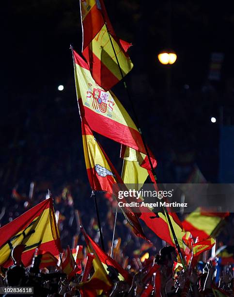 Supporters of Spanish national football team celebrate during the Spanish team's victory parade following their victory over the Netherlands in the...