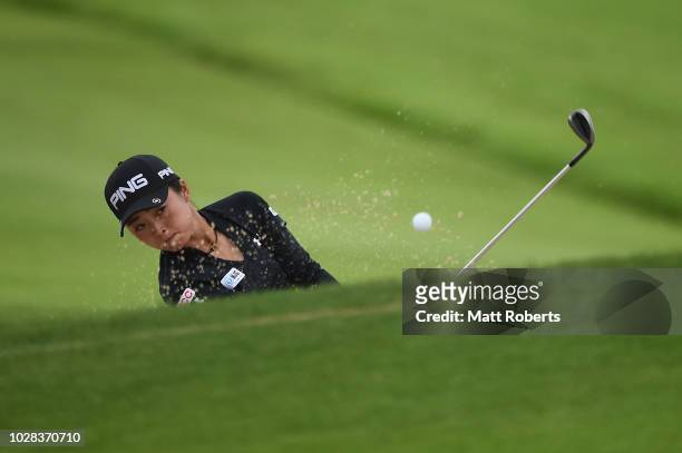 Yuki Ichinose of Japan hits out of the bunker on the 1st hole during the second round of the 2018 LPGA Championship Konica Minolta Cup at Kosugi...