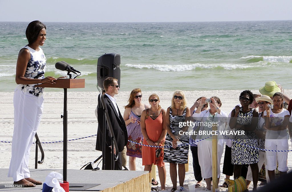 US First Lady, Michele Obama (L) address