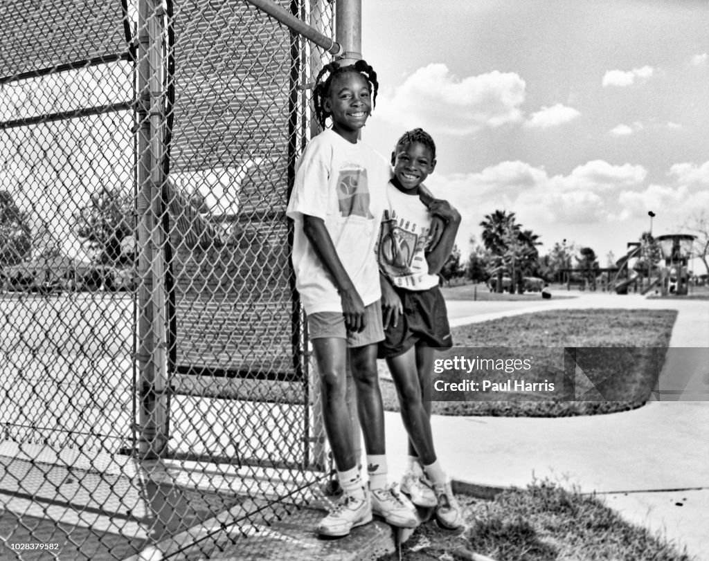 Venus & Serena Williams On Compton Tennis Court