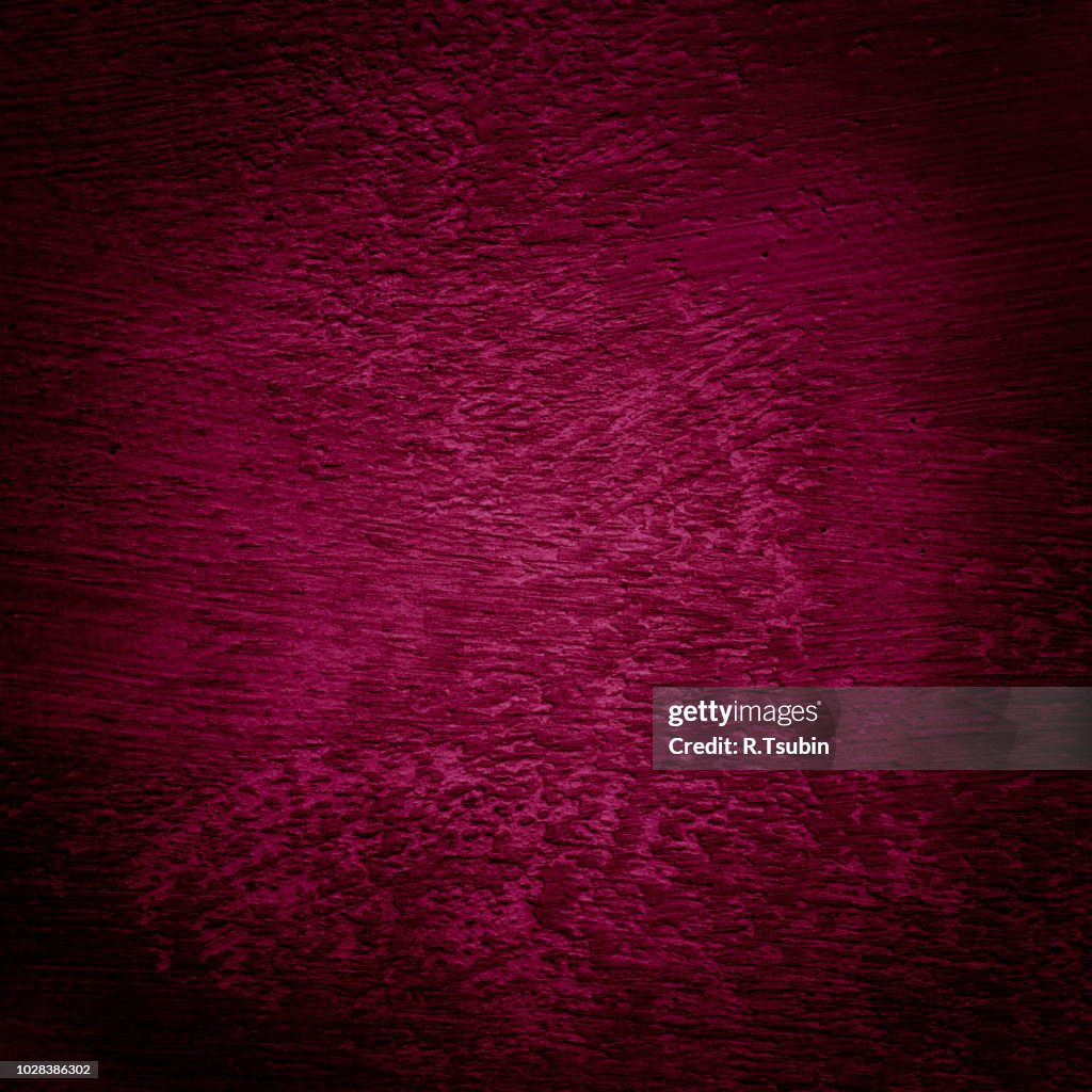 Red background wall texture with dark edges