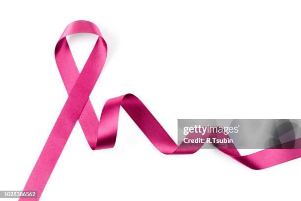 pink breast cancer ribbon isolated on white background - pink ribbon stock pictures, royalty-free photos & images