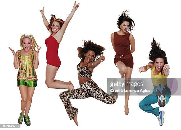 The Spice Girls, pose for a portrait shoot in London, England. Emma Bunton , Geri Halliwell , Mel B , Victoria Beckham and Mel C .