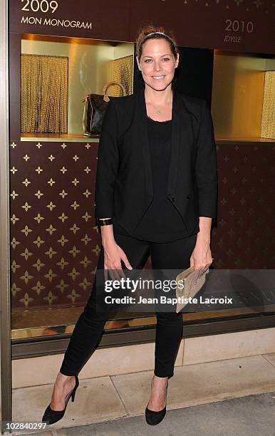 Maria Bello arrives at a cocktail party at the Louis Vuitton store on Rodeo Drive on July 13, 2010 in Beverly Hills, California.