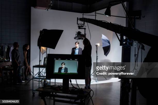 people working behind the scenes on a film set - actor stock pictures, royalty-free photos & images