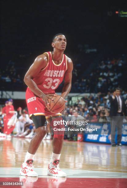 Otis Thorpe of the Houston Rockets shoots a free throw against the Washington Bullets during an NBA basketball game circa 1994 at the US Airways...