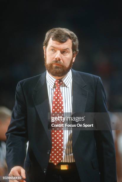 Head coach P.J. Carlesimo of the Seton Hall Pirates looks on against the Georgetown Hoyas during an NCAA College basketball game circa 1991 at the...