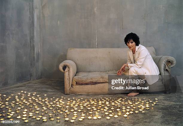Musician Enya poses for a portrait shoot on June 11, 2002 in London.