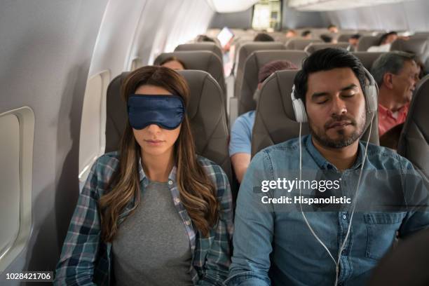 坐飛機旅行的人們 - jet lag 個照片及圖片檔