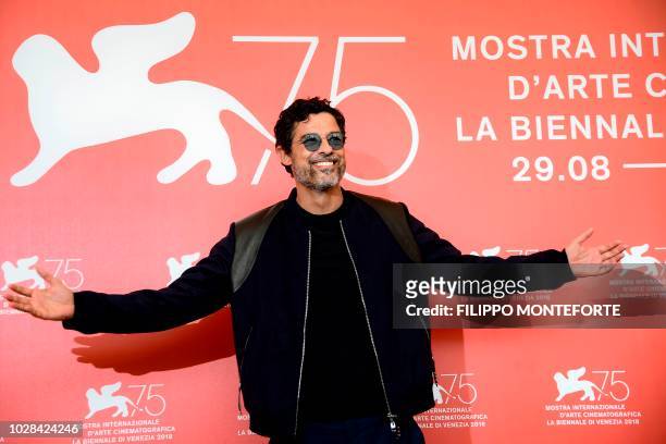 Actor Alessandro Gassmann attends a photocall for the film "Una Storia senza Nome" presented out of competition on September 7, 2018 during the 75th...