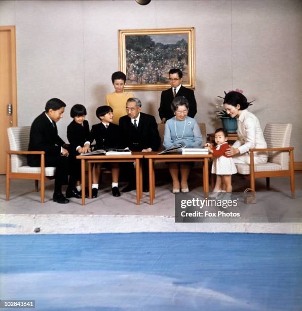 Emperor Hirohito of Japan and Empress Nagako with their family Crown Prine Akihito , Prince Akishino , Prince Naruhito , Princess Hanako of Hitachi ,...