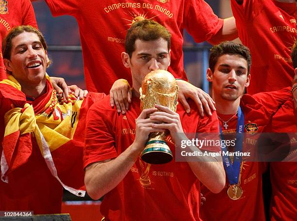 Spanish goalkeeper and capitain Iker Casillas kisses the cup on a stage set up for the Spanish team victory ceremony on July 12, 2010 in Madrid,...