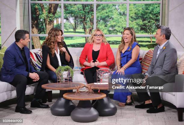 Marco Antonio Regil, Rashel Diaz, Ednita Nazario, Adamari Lopez and Hector Sandarti are seen on set of Un Nuevo Dia as they celebrate Adamari Lopez...