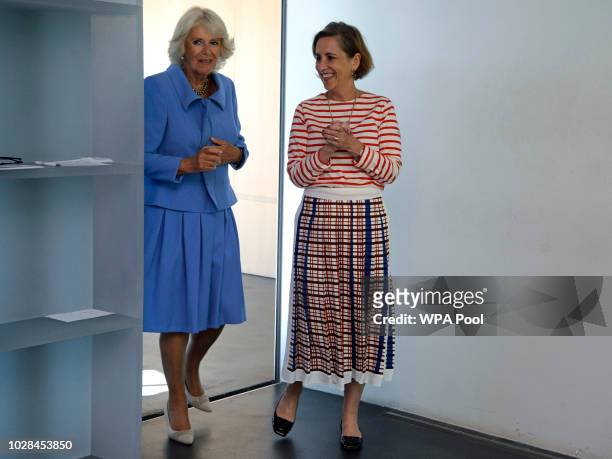 Camilla, Duchess of Rothesay speaks with Kirsty Wark, patron of Maggie's Centre during a visit to Maggie's Centre at Gartnavel Hospital on September...