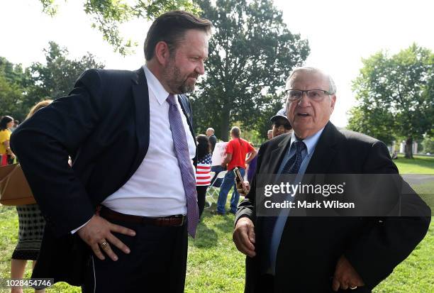 Sebastian Gorka , speaks with Joe Arpaio during a Angel Families rally at the U.S. Capitol on September 7, 2018 in Washington, DC. The rally was held...