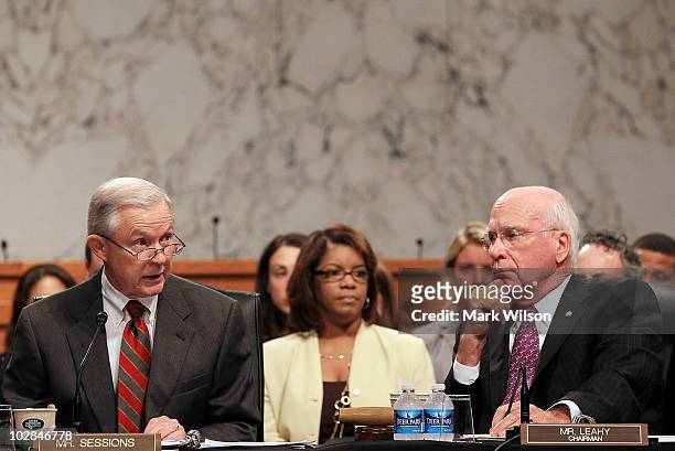 Sen. Jeff Sessions speaks as Committee Chairman Sen. Patrick Leahy looks on during a Senate Judiciary Committee business meeting on Capitol Hill,...